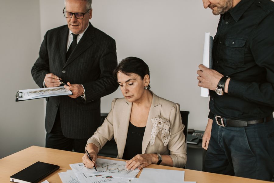 business team reviewing paperwork