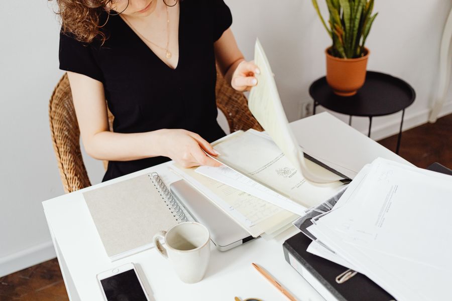 person organizing documents