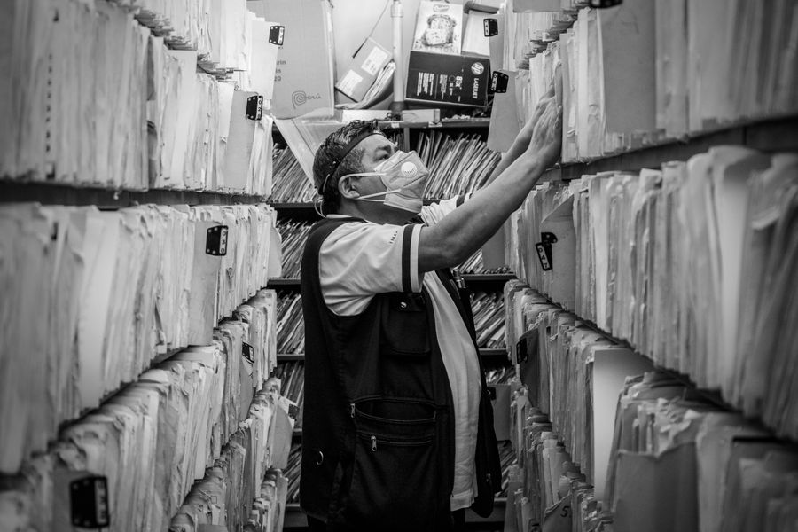 person organizing documents