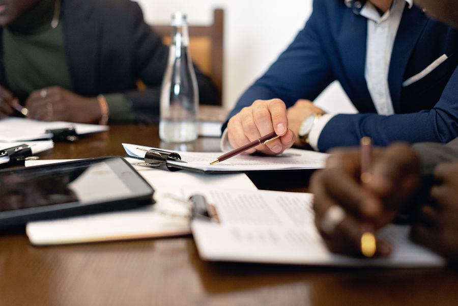 business team reviewing paperwork
