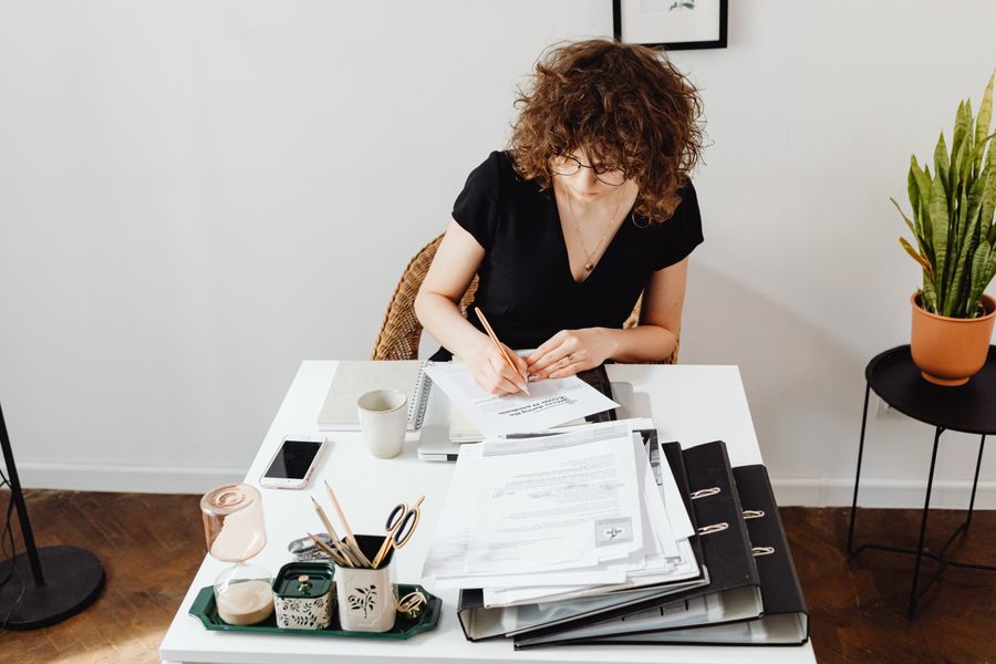 person organizing documents