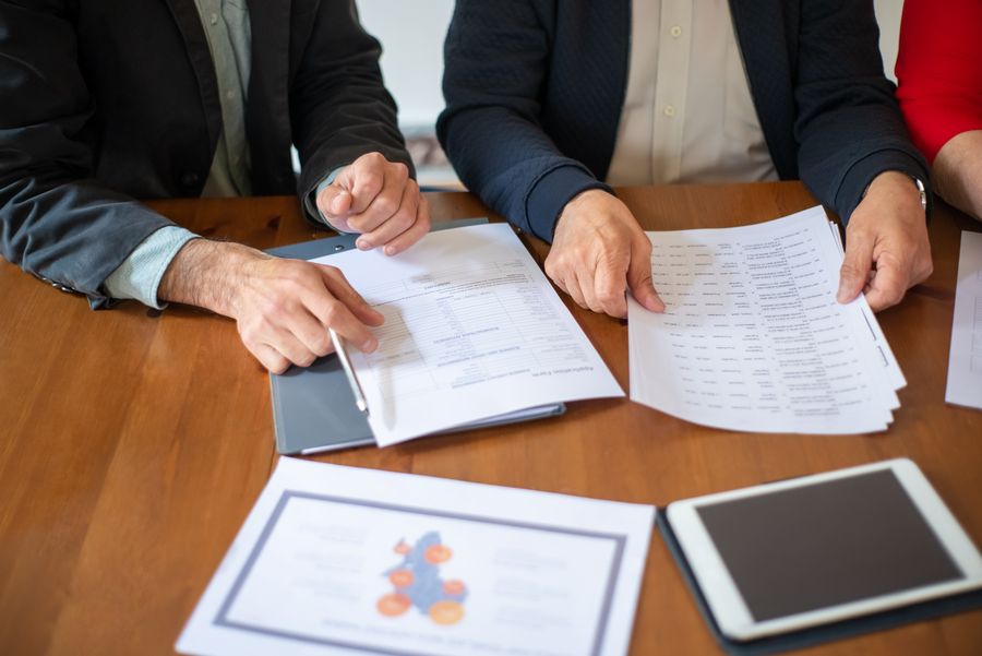 business team reviewing paperwork
