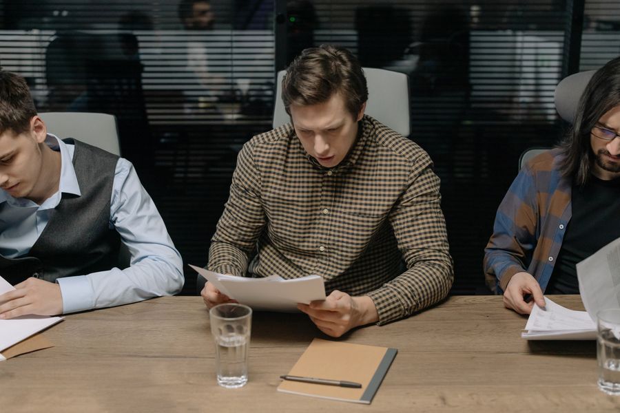 team reviewing papers
