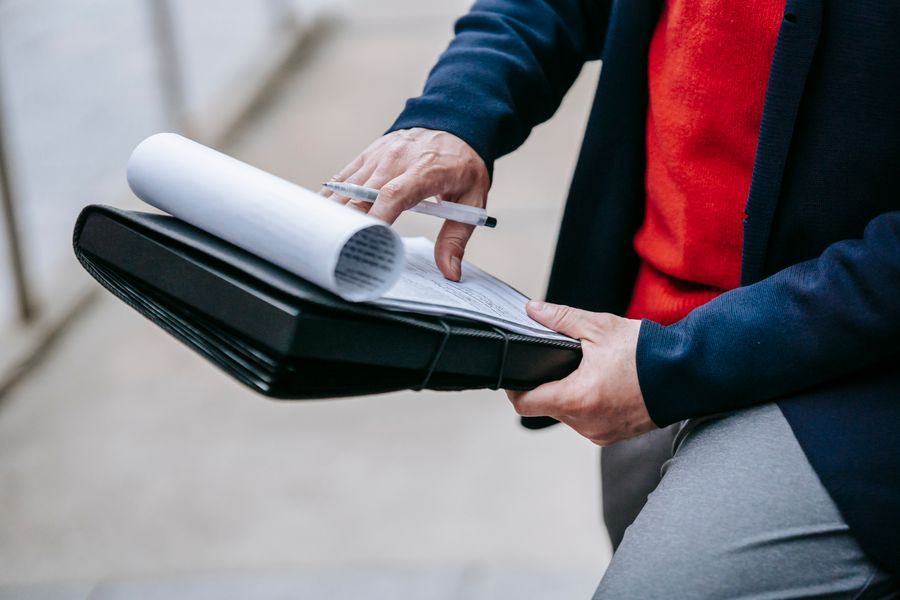 person organizing documents