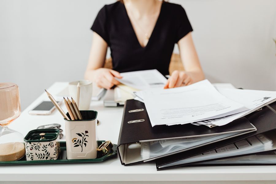 person organizing documents