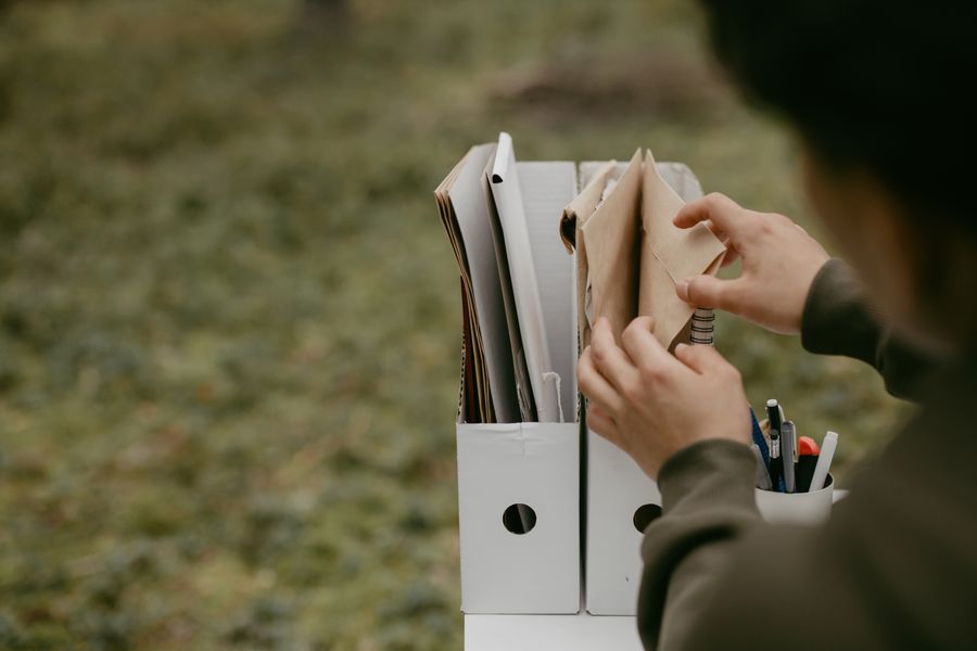 person organizing documents