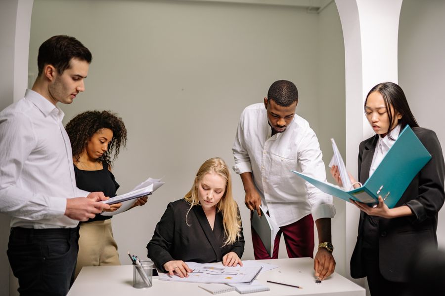 business team reviewing paperwork