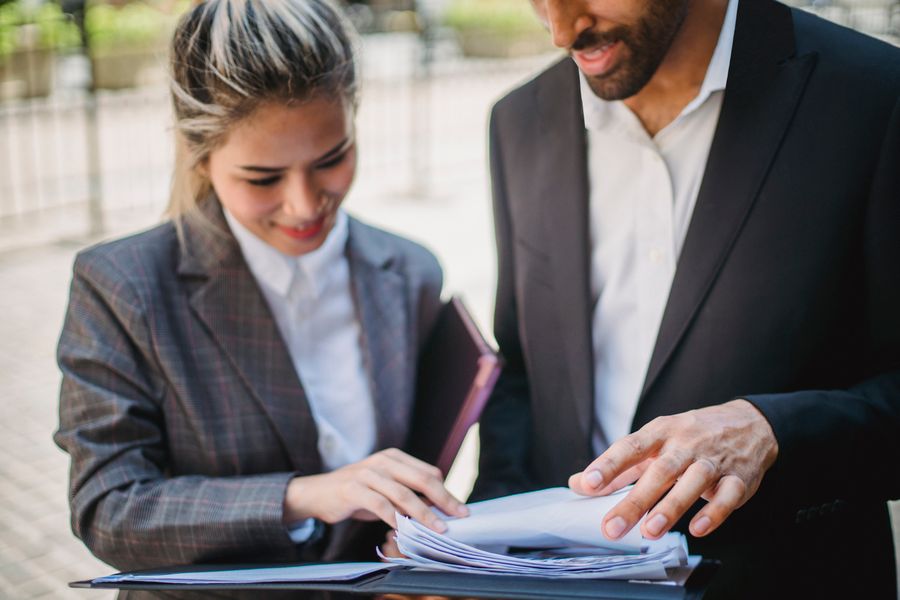 business team reviewing paperwork