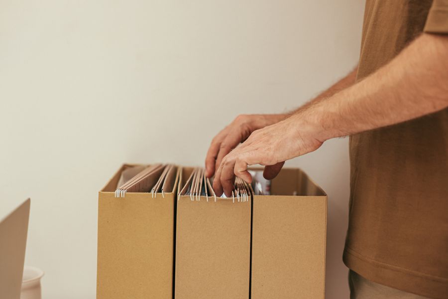 person organizing documents