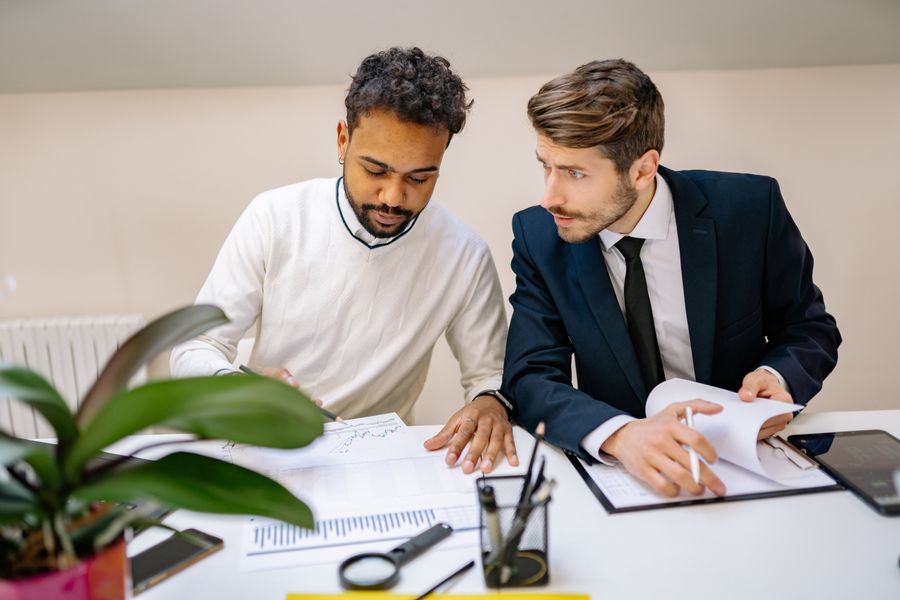 business team reviewing paperwork