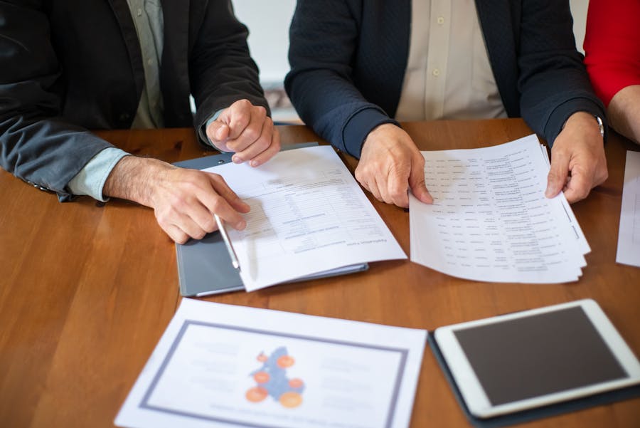 business team reviewing paperwork